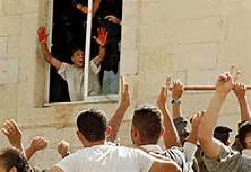 Teenaged Terrorists Displays Bloodied Hands Sending Crowd Gathered to Witness or Take Part in Sacrificing IDF Reservists Tearing Them Apart with Their Bare Hands